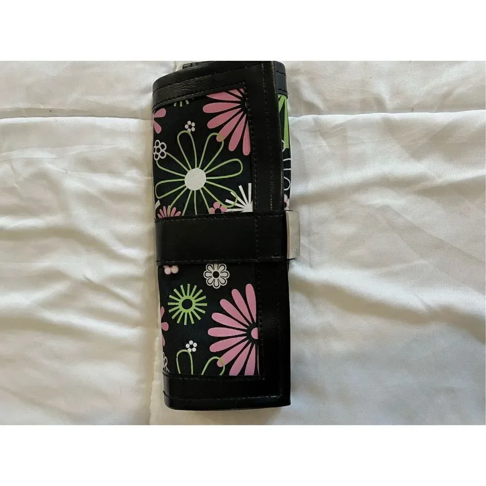 Black and bright floral print jewelry roll